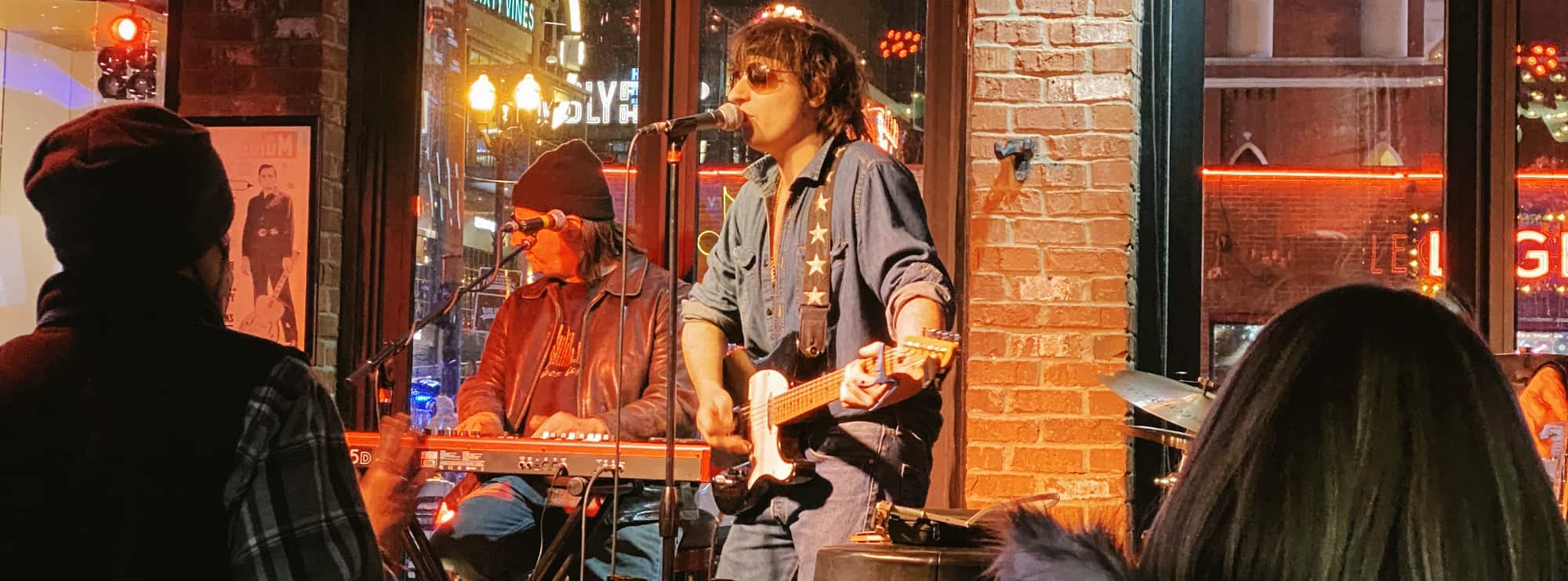 bar singer on guitar in Tampa
